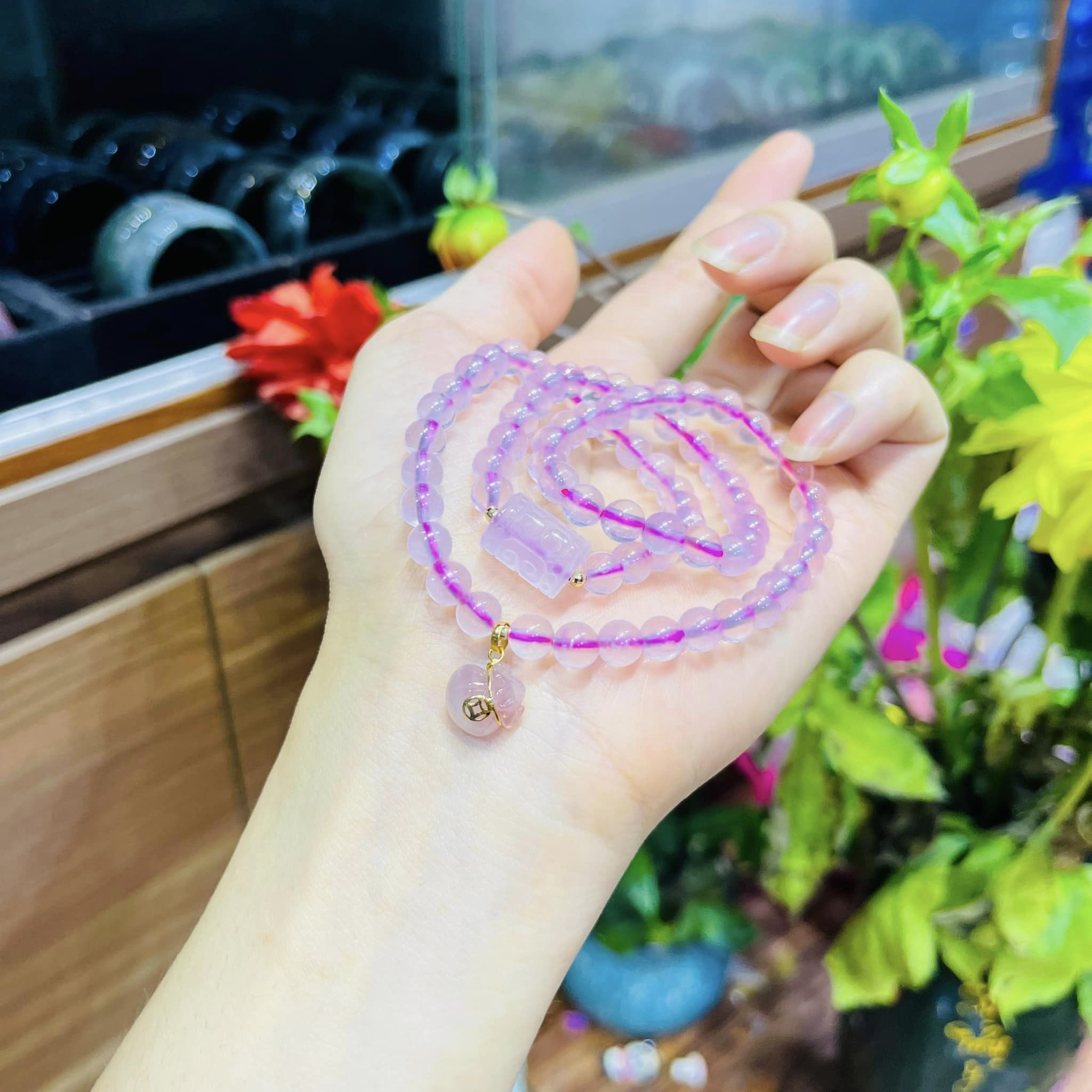 chuỗng vòng tay đá thạch anh hồng mix túi tiền