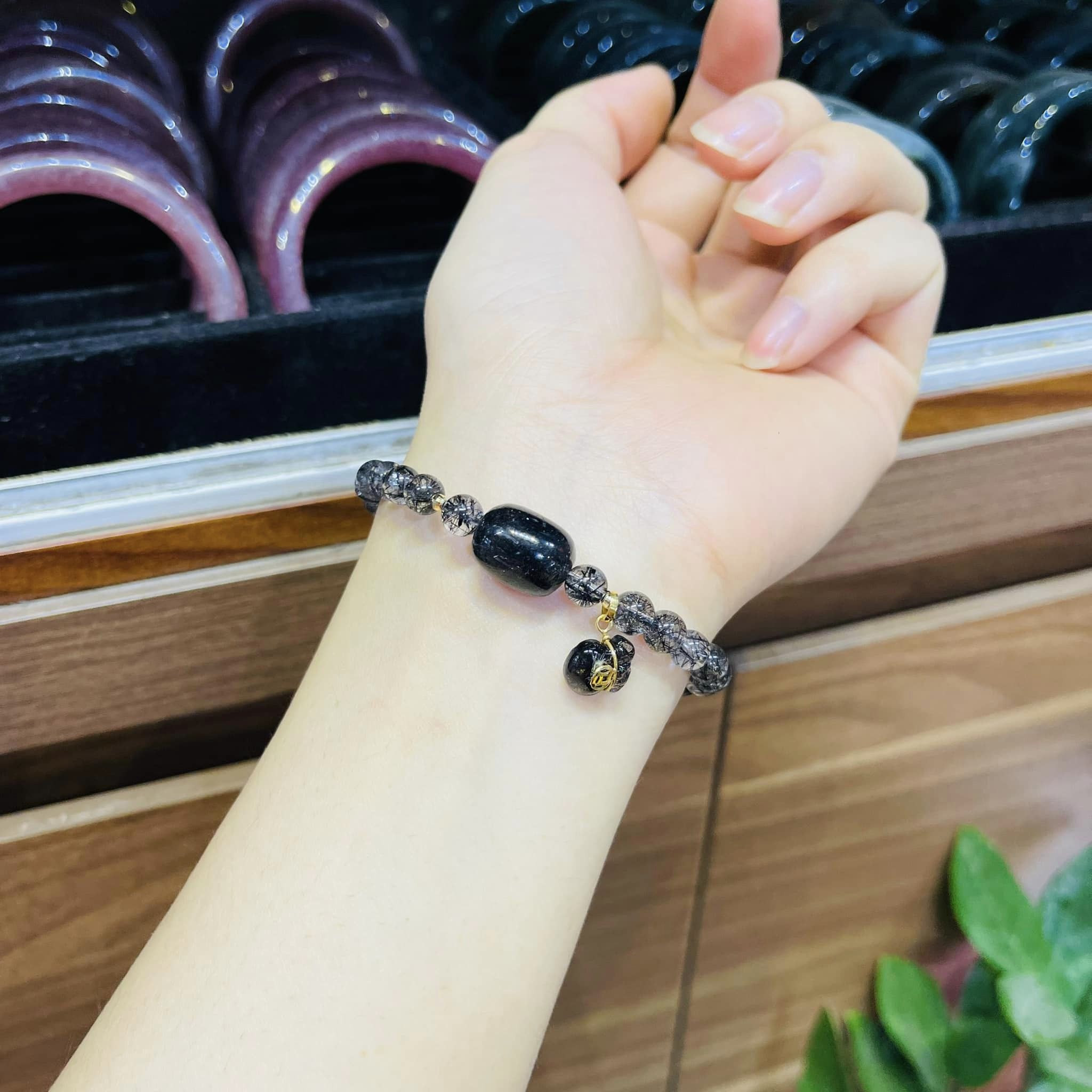 vòng tay tóc đen mix túi tiền
